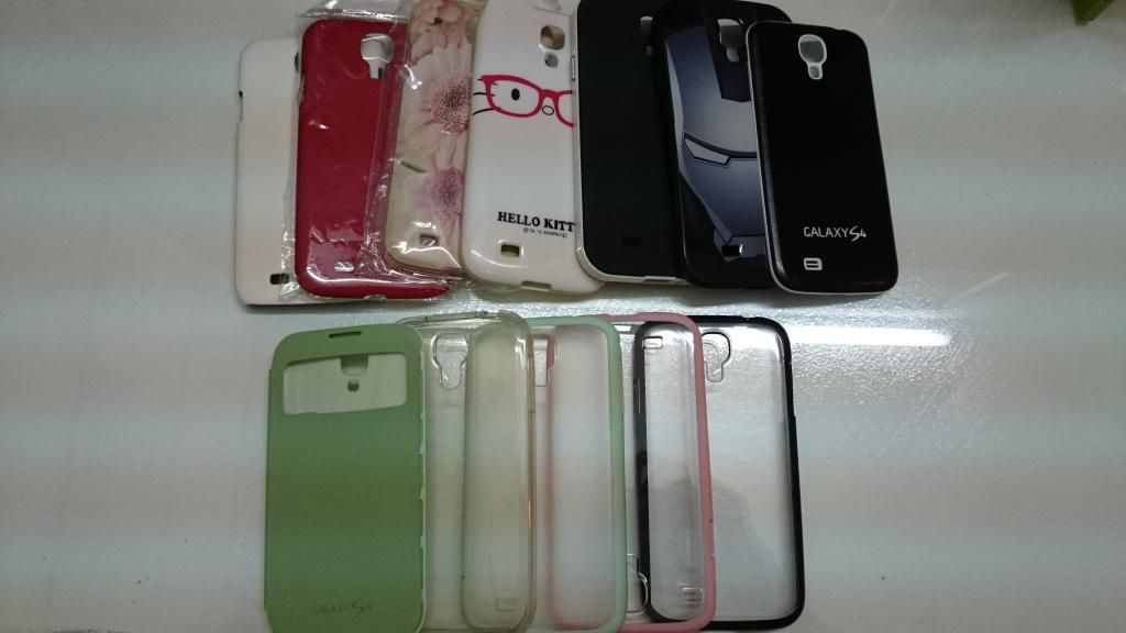 Thanh lý Samsung Galaxy S4 cũ, tặng rất  nhiều ốp lưng & bao da thông minh